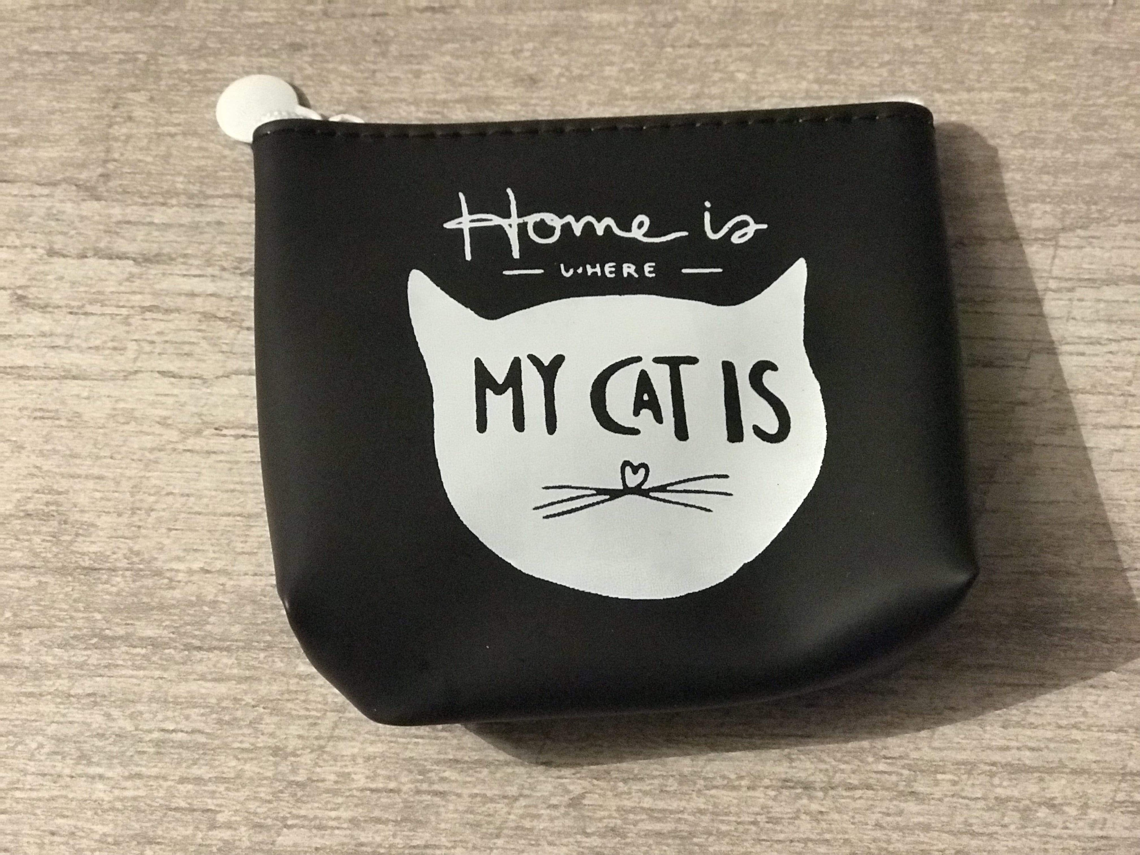 Porte-monnaie noir avec tête de chat blanche