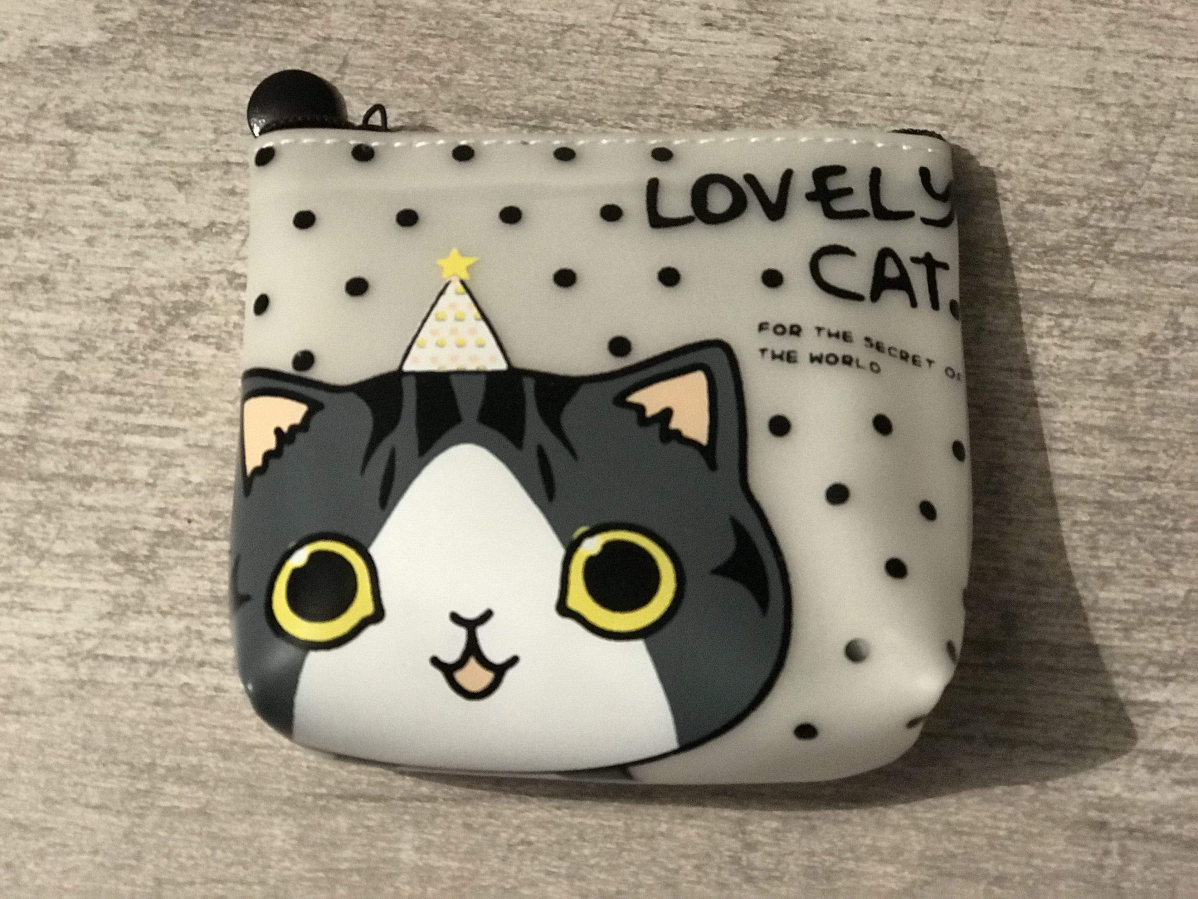 Porte-monnaie à pois avec chat blanc et gris