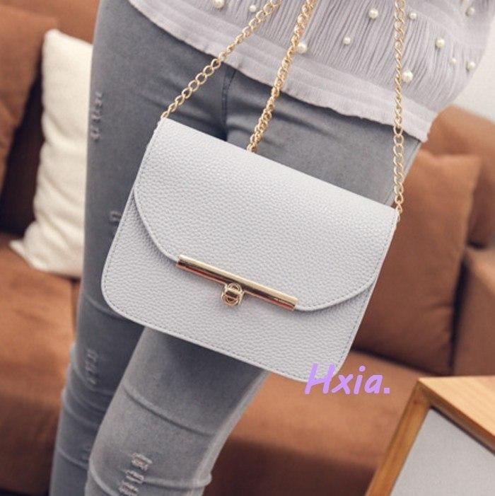 Petit sac à main en cuir avec bandoulière