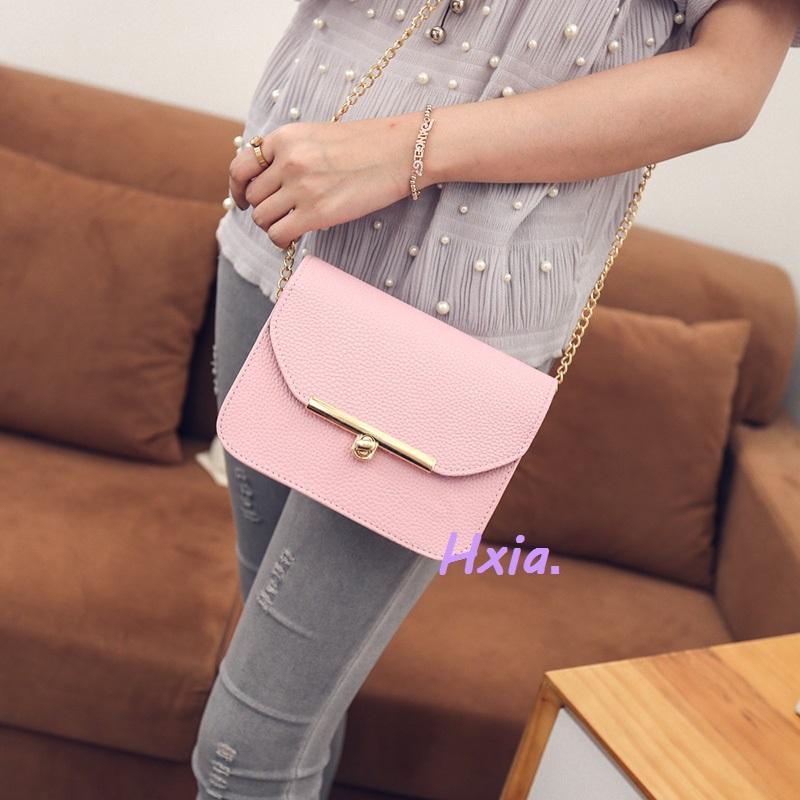 Petit sac à main en cuir avec bandoulière