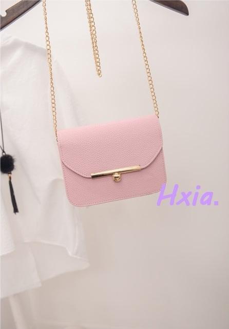 Petit sac à main en cuir avec bandoulière