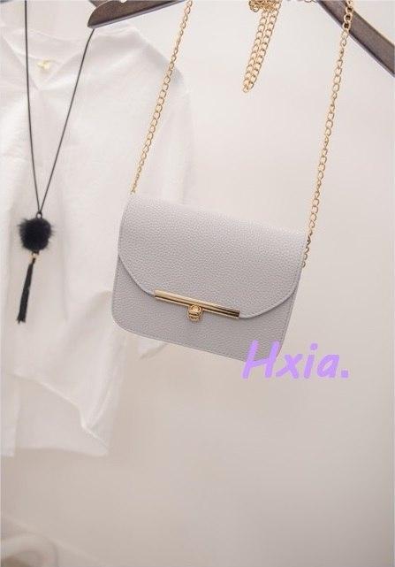 Petit sac à main en cuir avec bandoulière