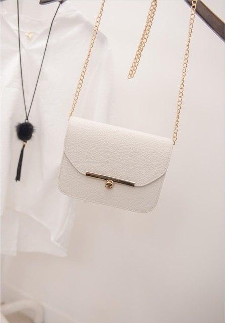 Petit sac à main en cuir avec bandoulière