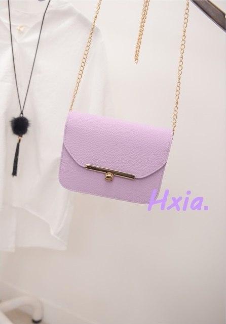Petit sac à main en cuir avec bandoulière