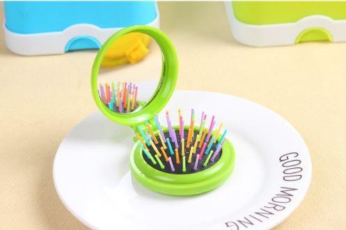 Brosse à cheveux colorée ronde et pliable avec miroir