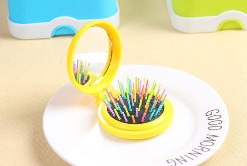 Brosse à cheveux colorée ronde et pliable avec miroir