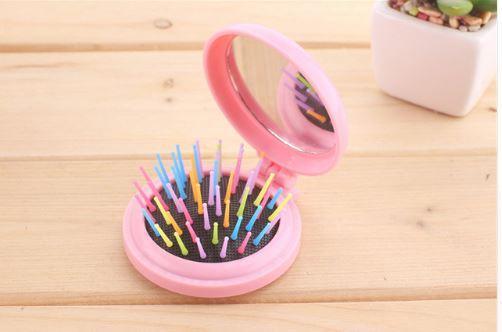 Brosse à cheveux colorée ronde et pliable avec miroir
