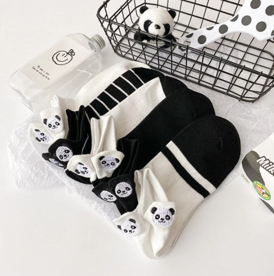 Lot de chaussettes avec des pandas