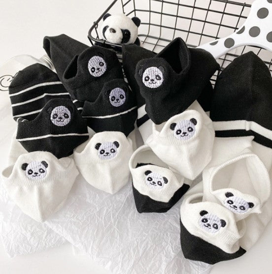 Lot de chaussettes avec des pandas